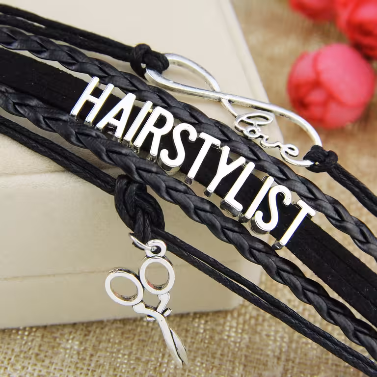 Juoda odinė kirpėjo apyrankė – Profesionali kirpėjų, plaukų stilistų ir barber aksesuarai