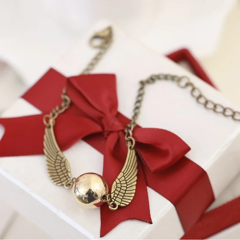 Harry Potter apyrankė Teminė apyrankė iš Haris Poterio serijos – su Snitch modeliu